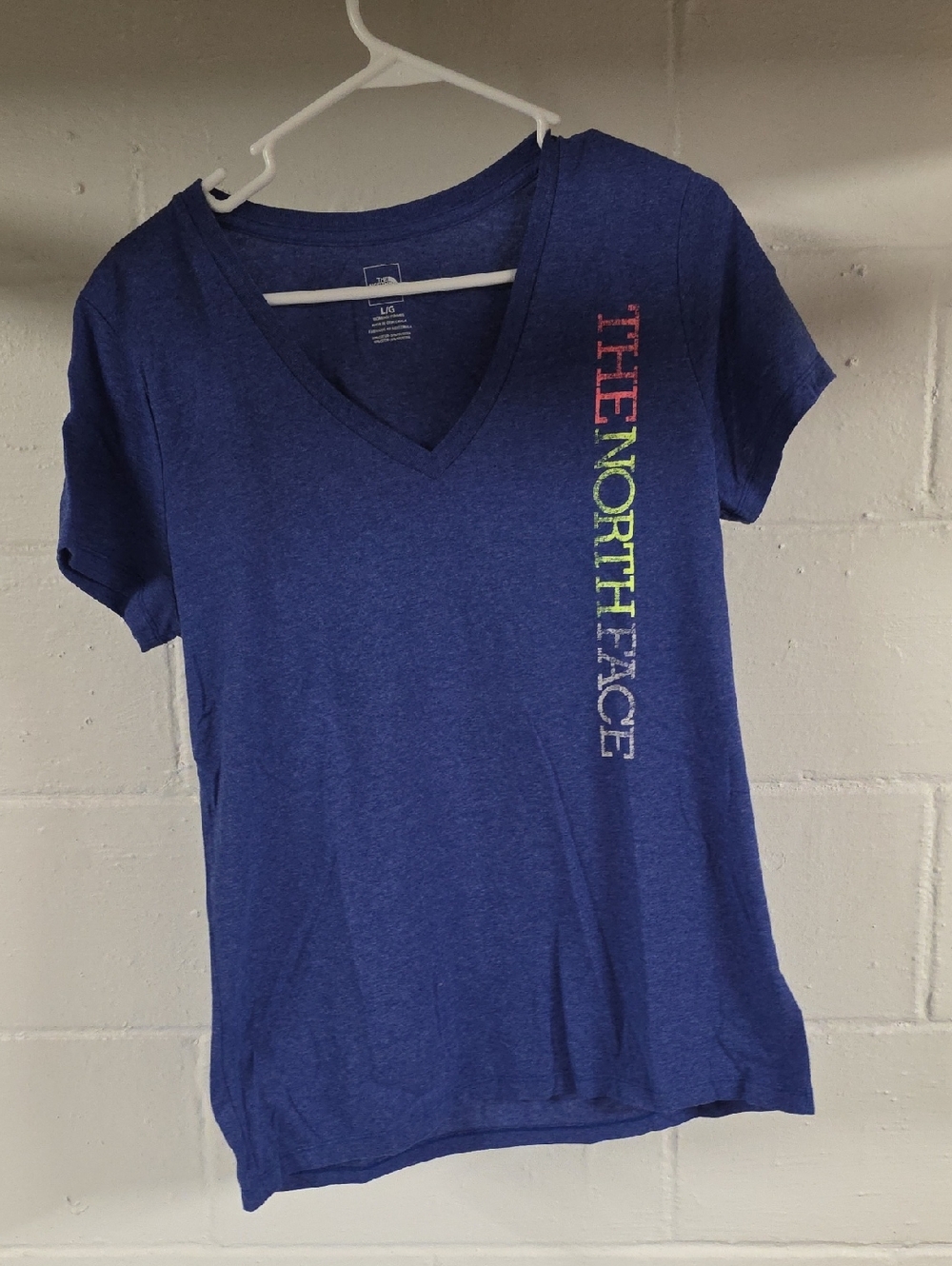 The North Face Women's Blue V-Neck Tee with Multicolor Vertical Logo